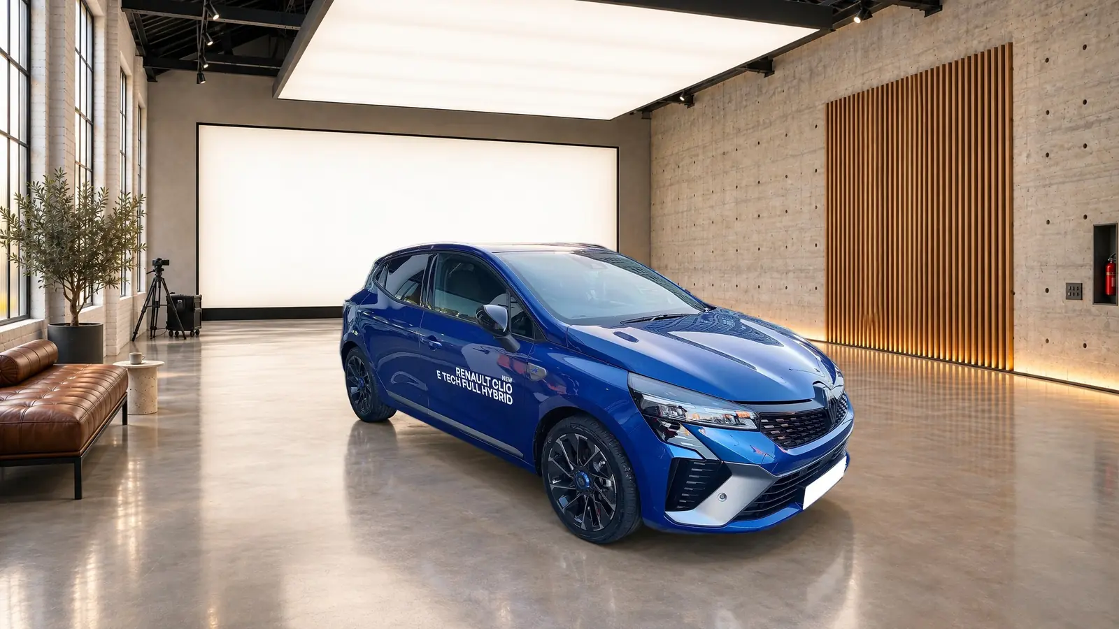La Clio bleue dans la même halle, carrosserie d'origine recollée
